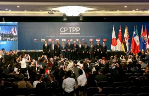 Chile Joins CPTPP, Boosts Malaysia Trade Chilean and Malaysian flags flank a document titled CPTPP, symbolizing the new trade partnership.