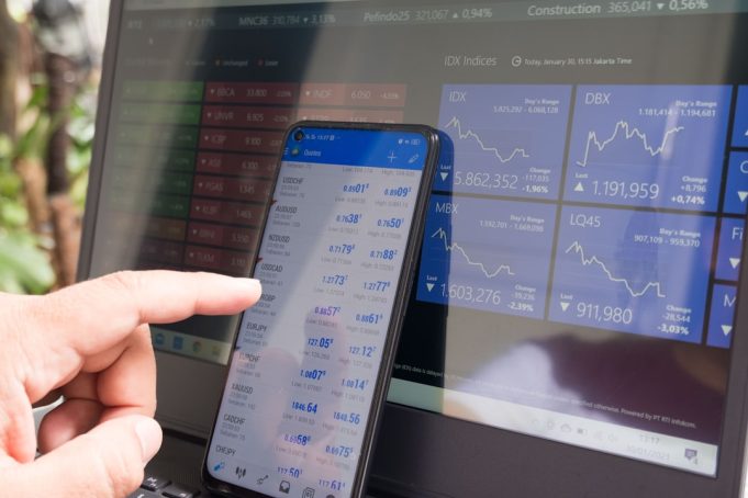Trump Media stock surges 15.6% but remains 54% below post-merger high A digital stock ticker showing DJT at $26.40 with a green upward arrow against a dark background.