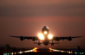 Boeing 737 MAX Grounded After Second Crash Kills 346 Row of grounded Boeing 737 MAX jets parked on a tarmac with empty runways in the background