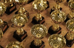 Kendrick Lamar Wins 5 Grammys, Tops Jay-Z Record Kendrick Lamar holds a Grammy award on stage at the Crypto.com Arena during the 68th Grammy ceremony.