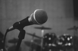 Hozier Drops “Too Sweet” as Lead Single from Seventh EP Hozier stands at a microphone in a dim studio, guitar slung low, releasing his new single "Too Sweet" under soft stage lights.