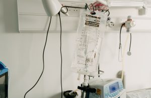 Dengue Cases Surge 416% Across Latin America Health workers in protective gear treat dengue patients in a crowded hospital ward in Brazil during the 2024 outbreak.