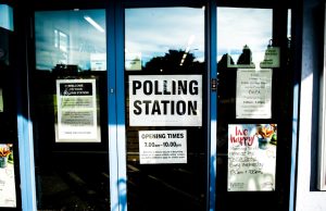 Election Commission Cites Logistics for 7-Phase Bengal Vote Voters stand in line at a polling station in West Bengal during the 2024 seven-phase general election.