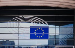 EU Centrists Win Vote but Far-Right Surges European Parliament chamber in Brussels with lawmakers seated during a session