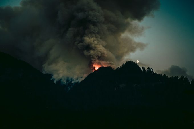 Smoldering ruins of historic buildings in Lahaina's district after the wildfire destroyed centuries-old Hawaiian royal sites.
