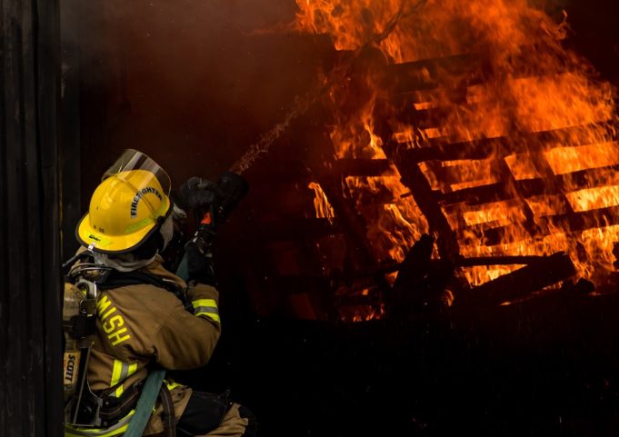 Kuwait Fire Kills 50 Migrant Workers, Highlights Safety Risks for Foreign Labor Firefighters and emergency vehicles at a burning apartment block in Mangaf, Kuwait, after a deadly fire killed 50 migrant workers.