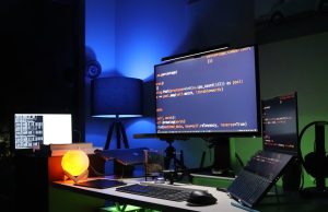 Stable Diffusion XL Reshapes Open-Source Image Generation A developer examines a high-resolution AI-generated image on a computer screen, with code visible in the background.