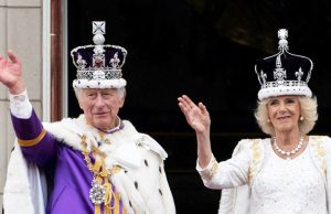 Charles III Crowned King in Historic Coronation Charles III and Camilla sit enthroned in Westminster Abbey during their coronation ceremony, surrounded by clergy and royal family members.