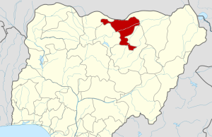 Nigeria Tanker Blast Kills 180 in Jigawa State Emergency responders and locals gather near the charred wreckage of an overturned gasoline tanker in Majiya, Jigawa State.