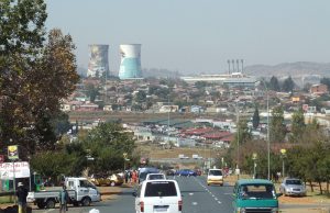 Soweto Building Collapse Kills Three, Injures Three Rescue workers search through rubble of a collapsed building in Soweto, Gauteng, as community members gather nearby.