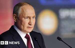 UK Condemns Putin Nuclear Threat Over Ukraine UK Foreign Minister Lord Ahmad speaking in parliament, condemning Putin's nuclear threats over the Ukraine conflict.