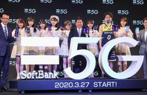 SoftBank Corp Launches 5G Service in Japan on April 1 SoftBank store front in Tokyo with 5G banner and customers testing new phones on launch day