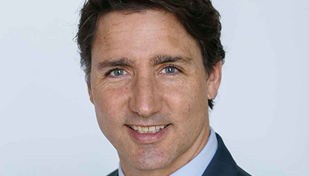 Trudeau Reaches Deal to Keep Power Until 2025 Justin Trudeau speaks at a podium in Toronto, announcing a political agreement with the New Democratic Party.