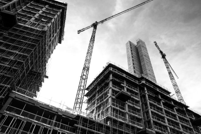 Indonesia's Q2 GDP surges 7.07%, yet virus resurgence threatens recovery Statistics Indonesia officials review GDP data charts showing a sharp economic rebound in Q2 2021.